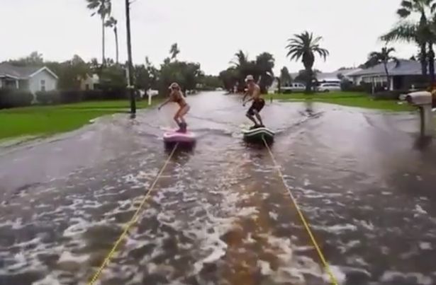 Extreme-flooding-from-Hurricane-Hermine-hasnt-stopped-this-pair-from-having-fun
