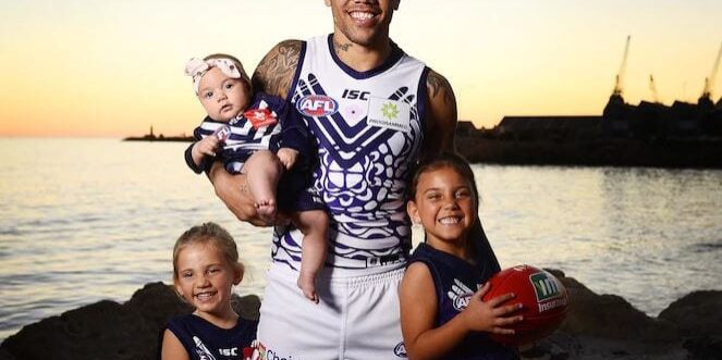 Freo's 2018 Sir Doug Nicholls Indigenous Round guernsey worn by Michael Walters. The guernsey was designed by respected Nyoongar figure Richard Walley with help from fan favourite Dale Kickett to reflect the six Nyoongar seasons (https://thewest.com.au/sport/afl/dockers-draft-dale-kickett-for-nyoongar-jumper-design-ng-b88410429z).